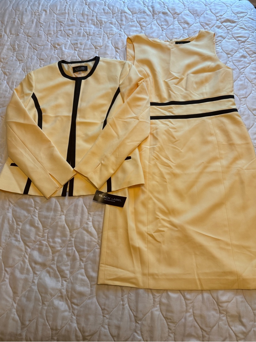 Yellow and black women’s dress suit.  Size 12.  New with tag.